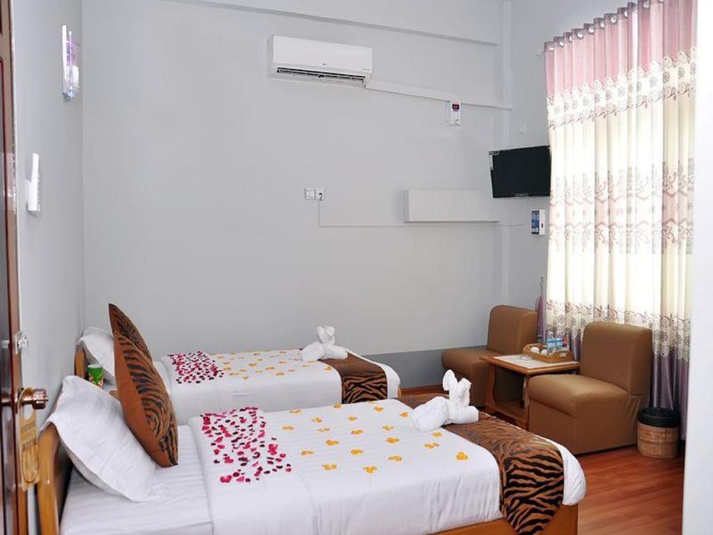 Royal Tulip Hotel مانديلاي الغرفة الصورة