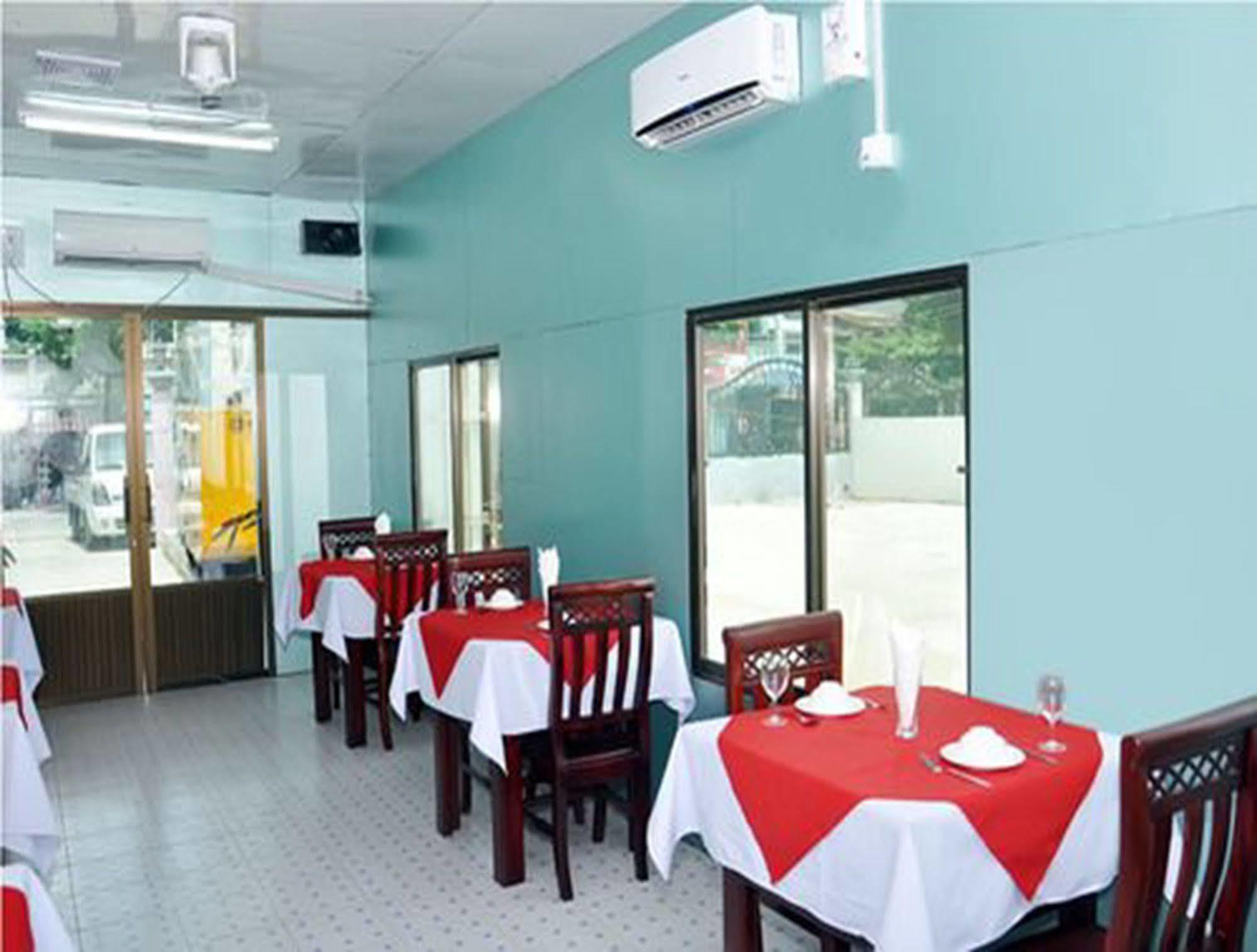 Royal Tulip Hotel مانديلاي المظهر الخارجي الصورة